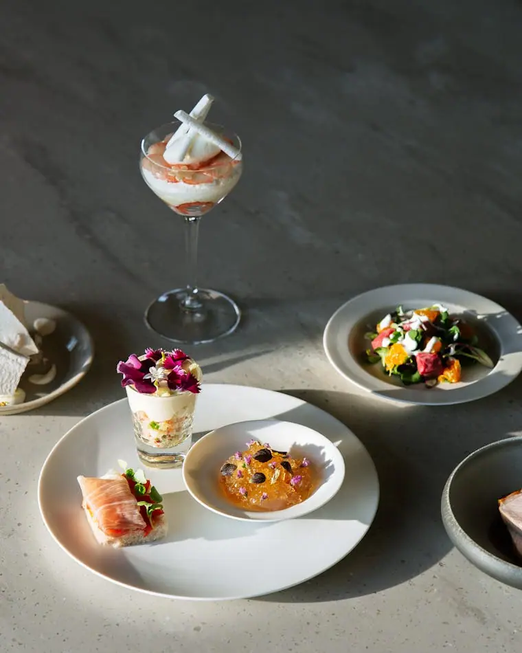 A plated fine-dining course presented on ceramic