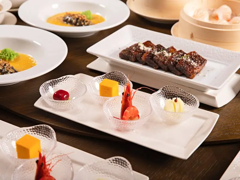 A gourmet tasting plate with seasonal garnish